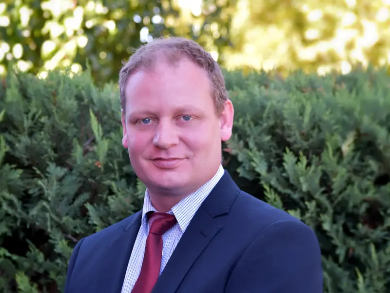 Adrian Bear, Founder and Managing Director